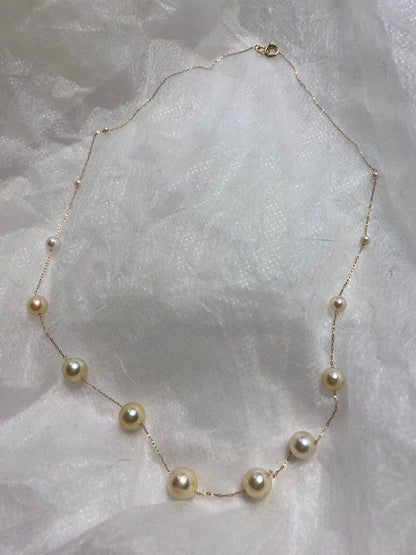 Fresh Perlagione Akoya pearl necklace in 14K yellow gold with champagne tone pearls of various sizes on a 45cm chain