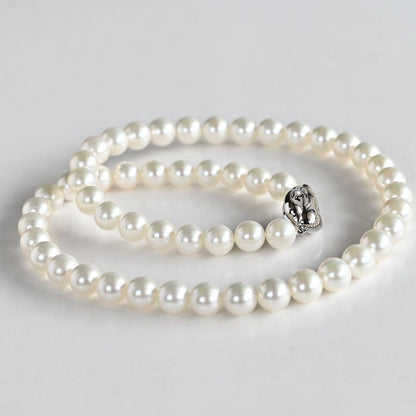 Takatsuki Akoya pearl necklace with round white pearls 7.5-8mm and silver clasp on a 42.5cm strand