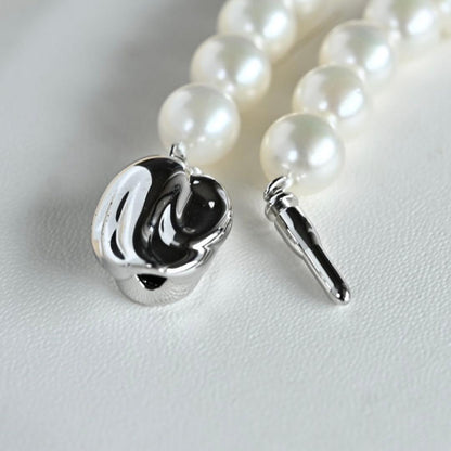 Takatsuki Akoya pearl necklace with round white pearls 7.5-8mm and silver clasp on a 42.5cm strand