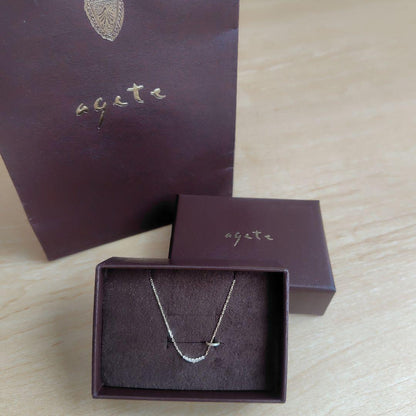 Agete K10 yellow gold diamond necklace with 40cm chain and 0.3 x 1 cm pendant featuring a small center diamond