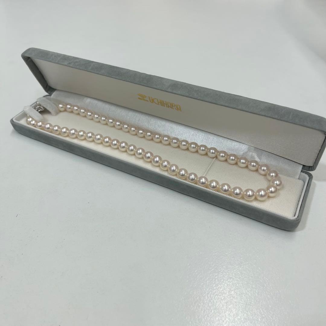 Akoya pearl necklace with 7.4mm pearls, 41cm length, displayed on a white background