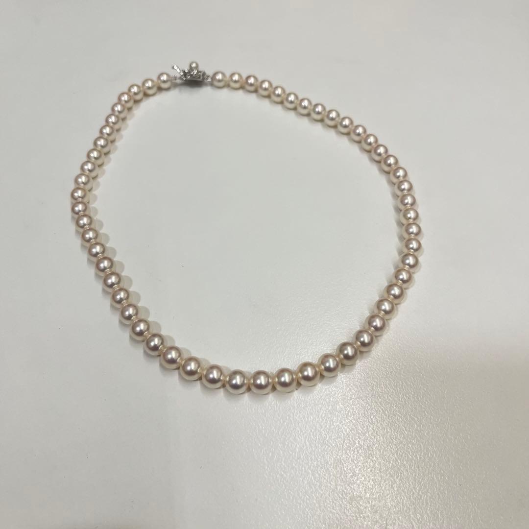 Akoya pearl necklace with 7.4mm pearls, 41cm length, displayed on a white background