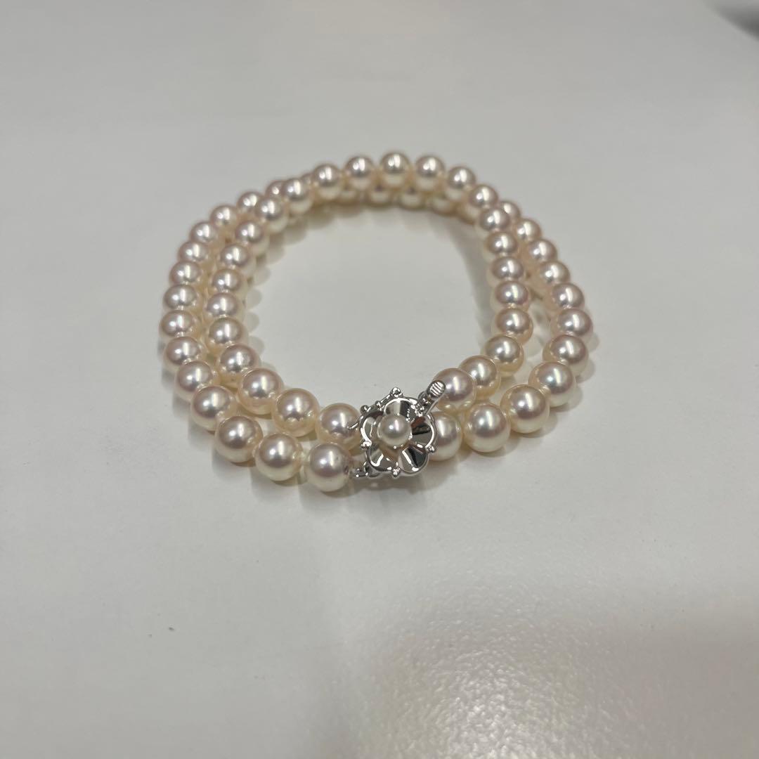 Akoya pearl necklace with 7.4mm pearls, 41cm length, displayed on a white background
