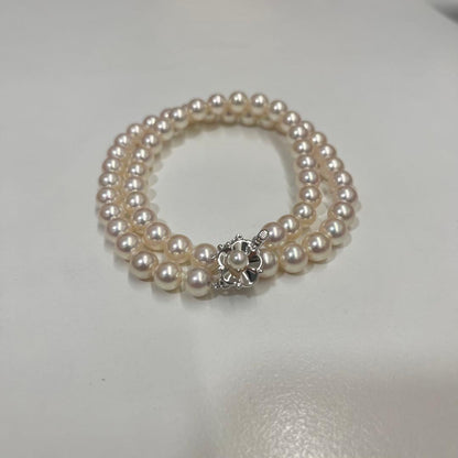 Akoya pearl necklace with 7.4mm pearls, 41cm length, displayed on a white background
