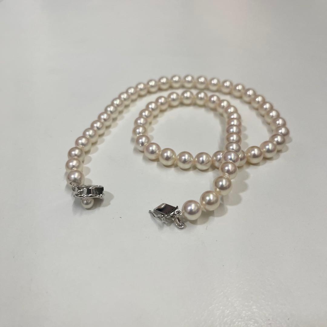 Akoya pearl necklace with 7.4mm pearls, 41cm length, displayed on a white background