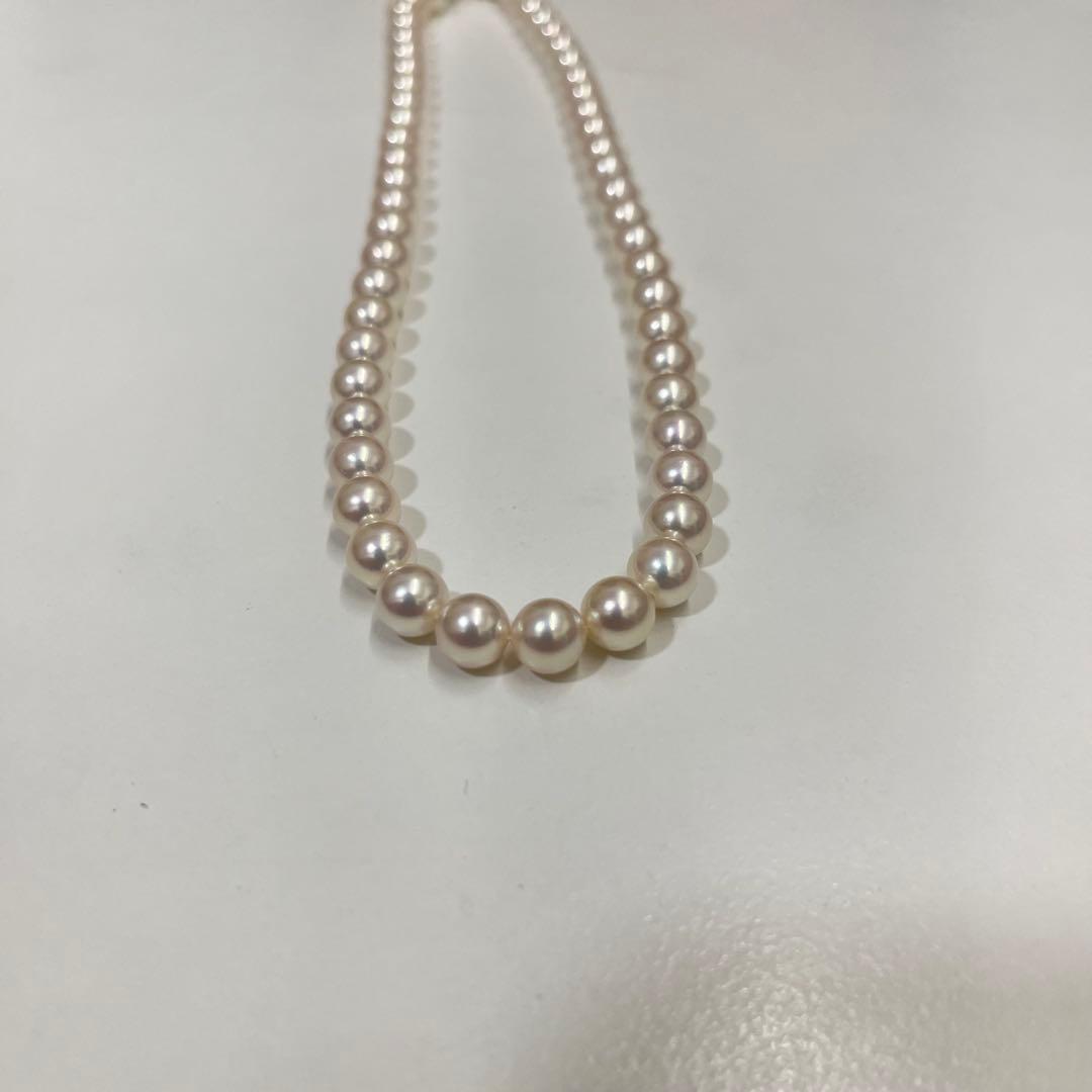 Akoya pearl necklace with 7.4mm pearls, 41cm length, displayed on a white background