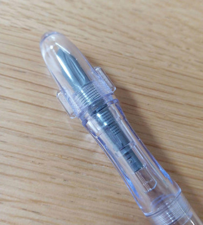 Pilot Penmanship clear fountain pen with extra fine nib, includes case and ink, new and unused