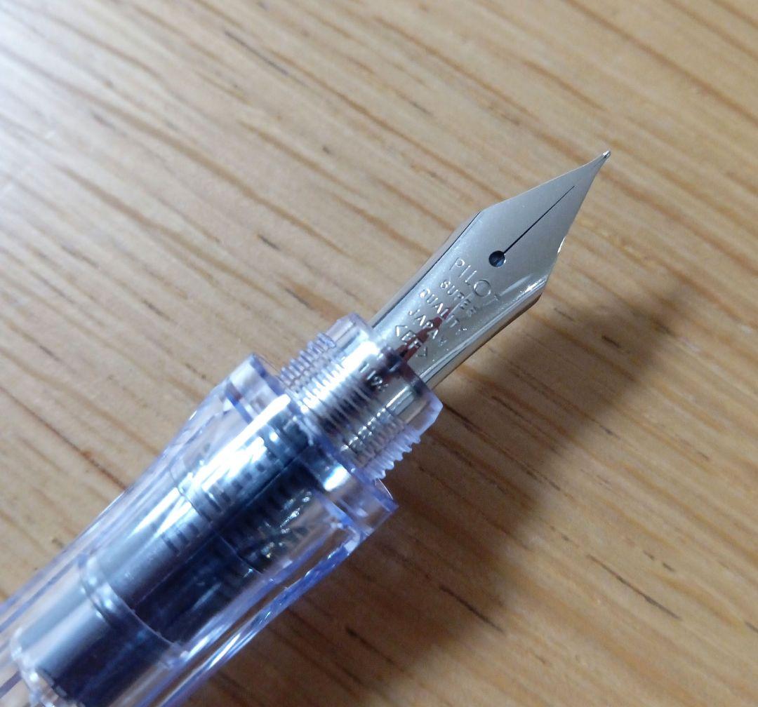 Pilot Penmanship clear fountain pen with extra fine nib, includes case and ink, new and unused