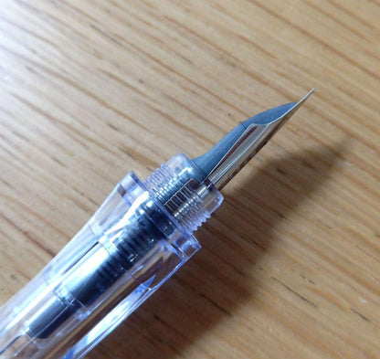 Pilot Penmanship clear fountain pen with extra fine nib, includes case and ink, new and unused