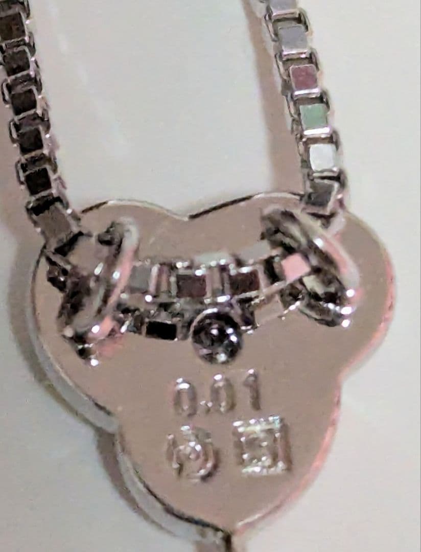 Tasaki pearl necklace with sterling silver chain and 0.01 carat diamond pendant, medium pearl, lobster clasp