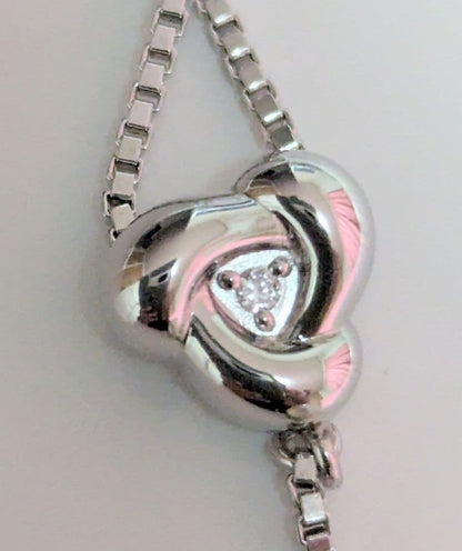 Tasaki pearl necklace with sterling silver chain and 0.01 carat diamond pendant, medium pearl, lobster clasp
