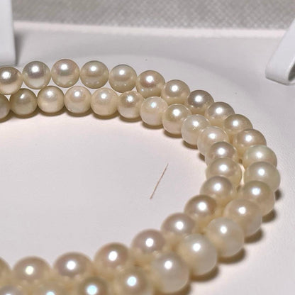 Close-up of Ise-Shima white Akoya pearl necklace with 5.4-5.9mm round pearls and silver clasp