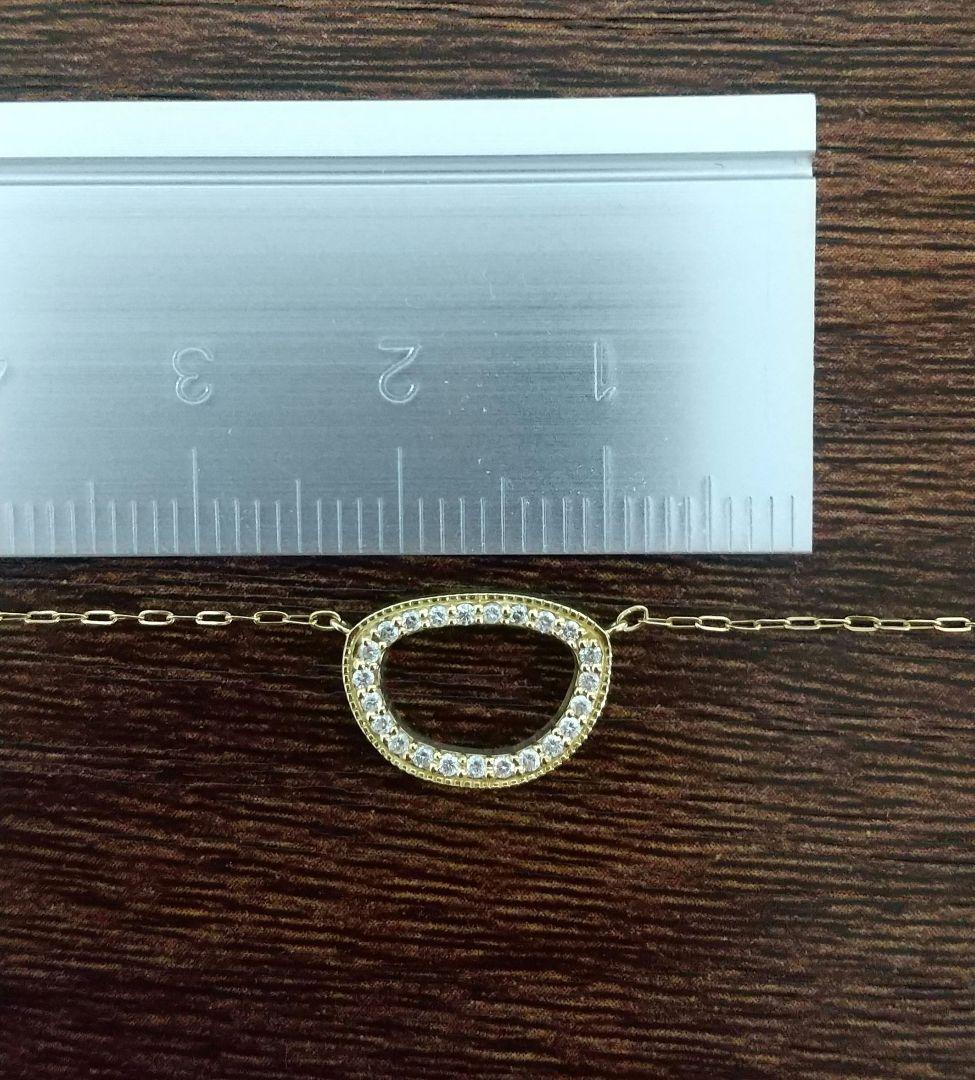 Agete 18K gold diamond necklace with 40cm adjustable chain and 13mm motif