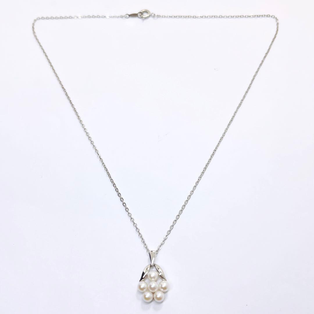 Mikimoto baby pearl necklace with 3.9mm pearl and silver flower pendant on 40cm chain