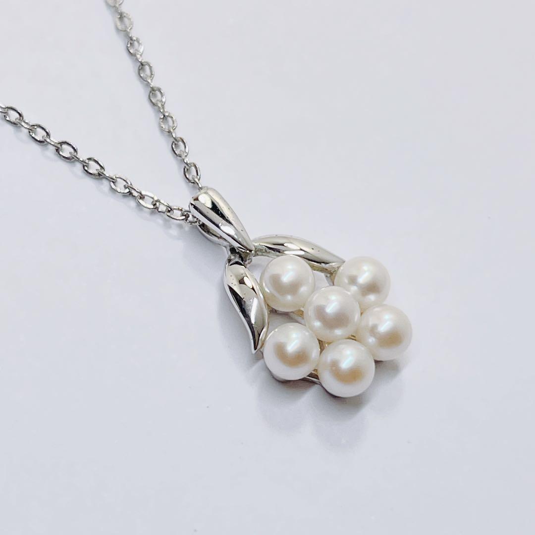 Mikimoto baby pearl necklace with 3.9mm pearl and silver flower pendant on 40cm chain