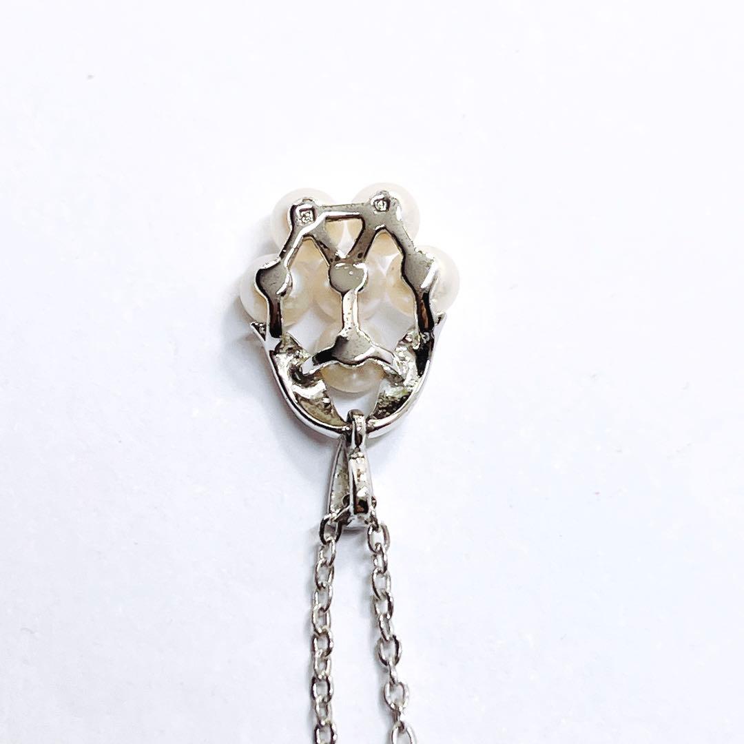 Mikimoto baby pearl necklace with 3.9mm pearl and silver flower pendant on 40cm chain