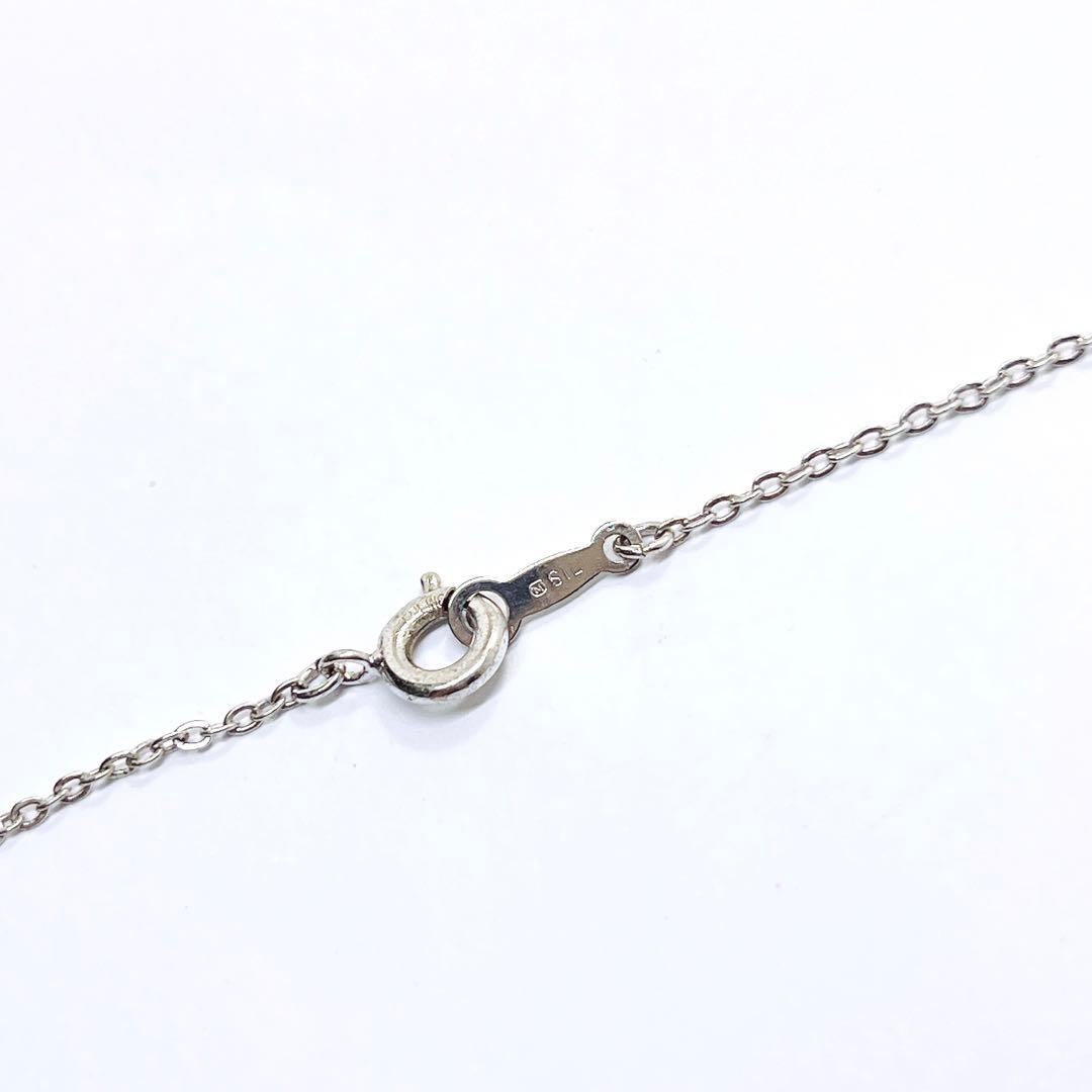 Mikimoto baby pearl necklace with 3.9mm pearl and silver flower pendant on 40cm chain
