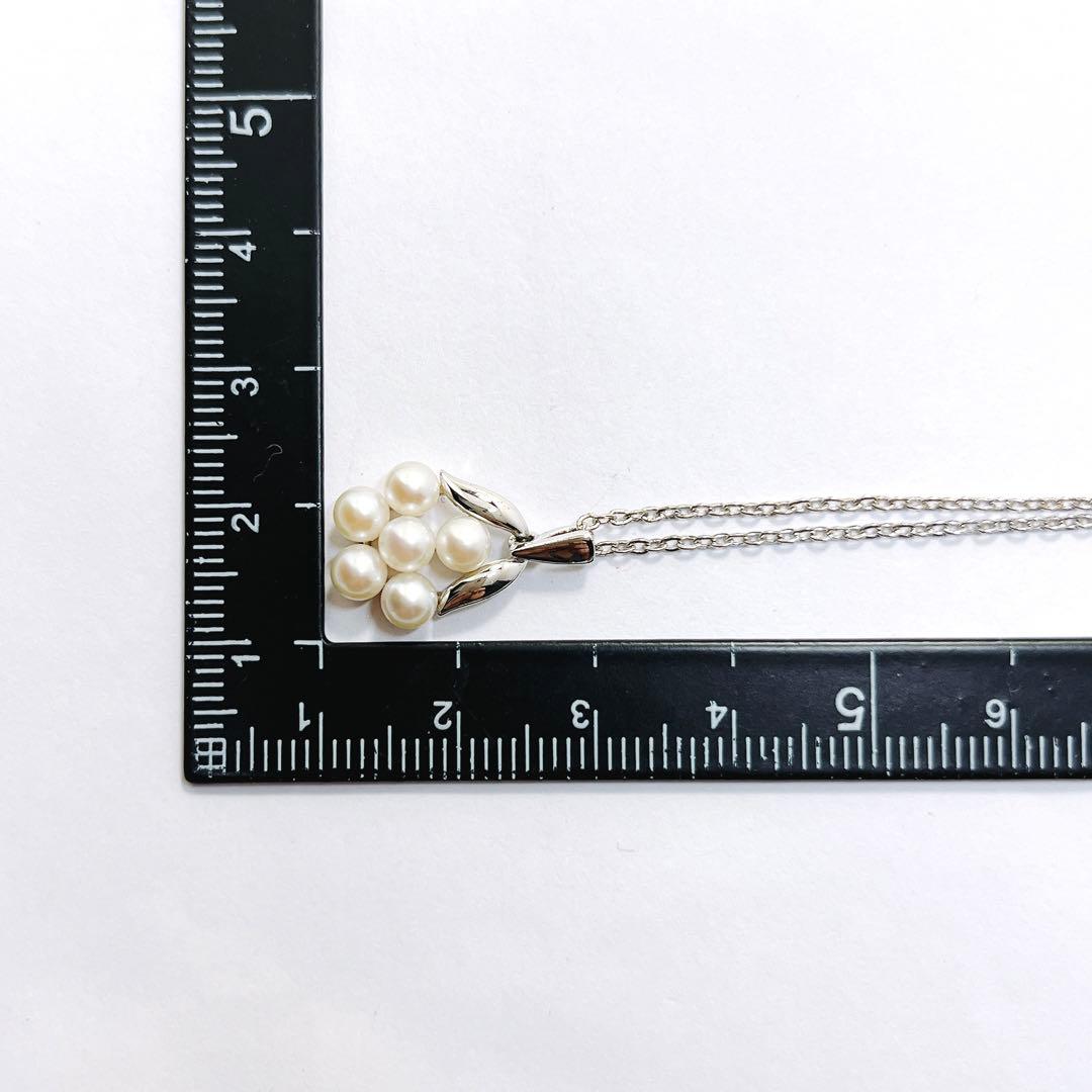 Mikimoto baby pearl necklace with 3.9mm pearl and silver flower pendant on 40cm chain