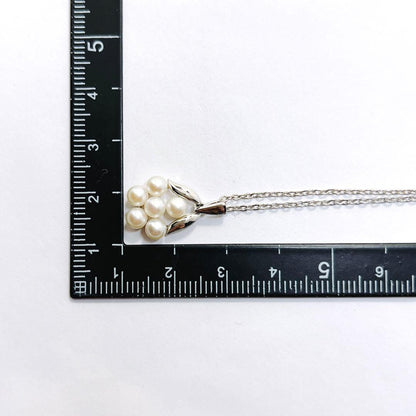 Mikimoto baby pearl necklace with 3.9mm pearl and silver flower pendant on 40cm chain
