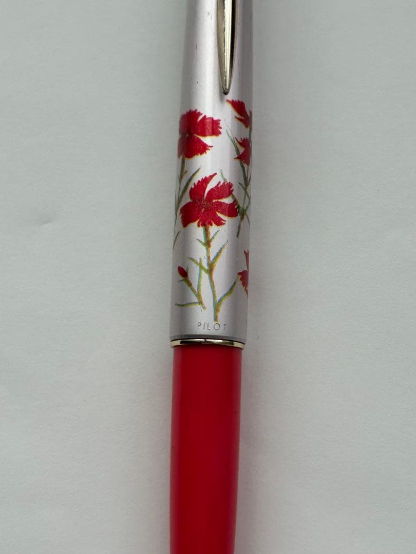 Close-up of PILOT Fountain Pen Model 14K-585 with gold nib and black barrel