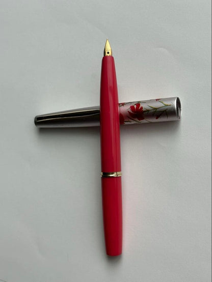 Close-up of PILOT Fountain Pen Model 14K-585 with gold nib and black barrel