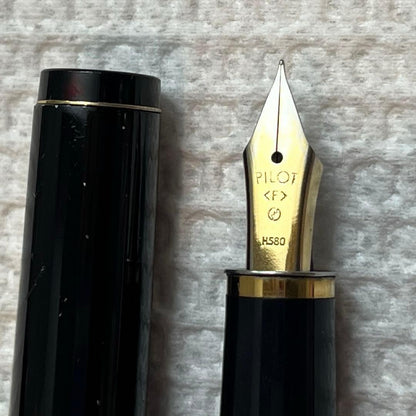 Pilot H580 F fountain pen black and gold with Japan Continent logo on cap and old JIS logo on nib plus old ink