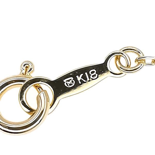 Law ring in K18 yellow gold featuring a 6.7mm pearl and diamond side stones, size height 11.3mm