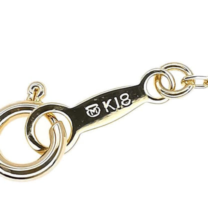Law ring in K18 yellow gold featuring a 6.7mm pearl and diamond side stones, size height 11.3mm