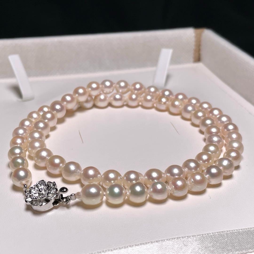 Akoya Pearl Hanjudekira semi-round necklace with 6.3-7.0mm white pearls on silver chain approximately 47.7cm long mark O588