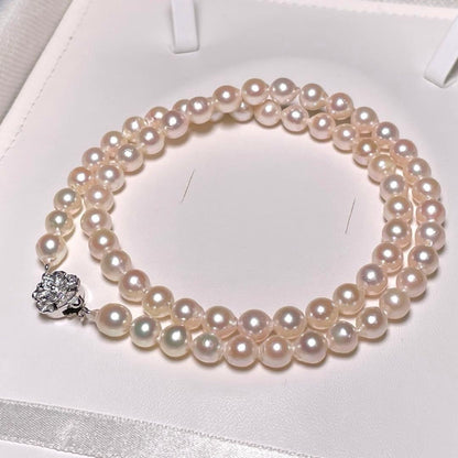 Akoya Pearl Hanjudekira semi-round necklace with 6.3-7.0mm white pearls on silver chain approximately 47.7cm long mark O588