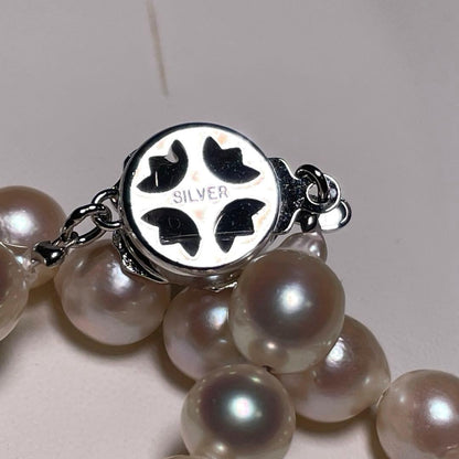Akoya Pearl Hanjudekira semi-round necklace with 6.3-7.0mm white pearls on silver chain approximately 47.7cm long mark O588
