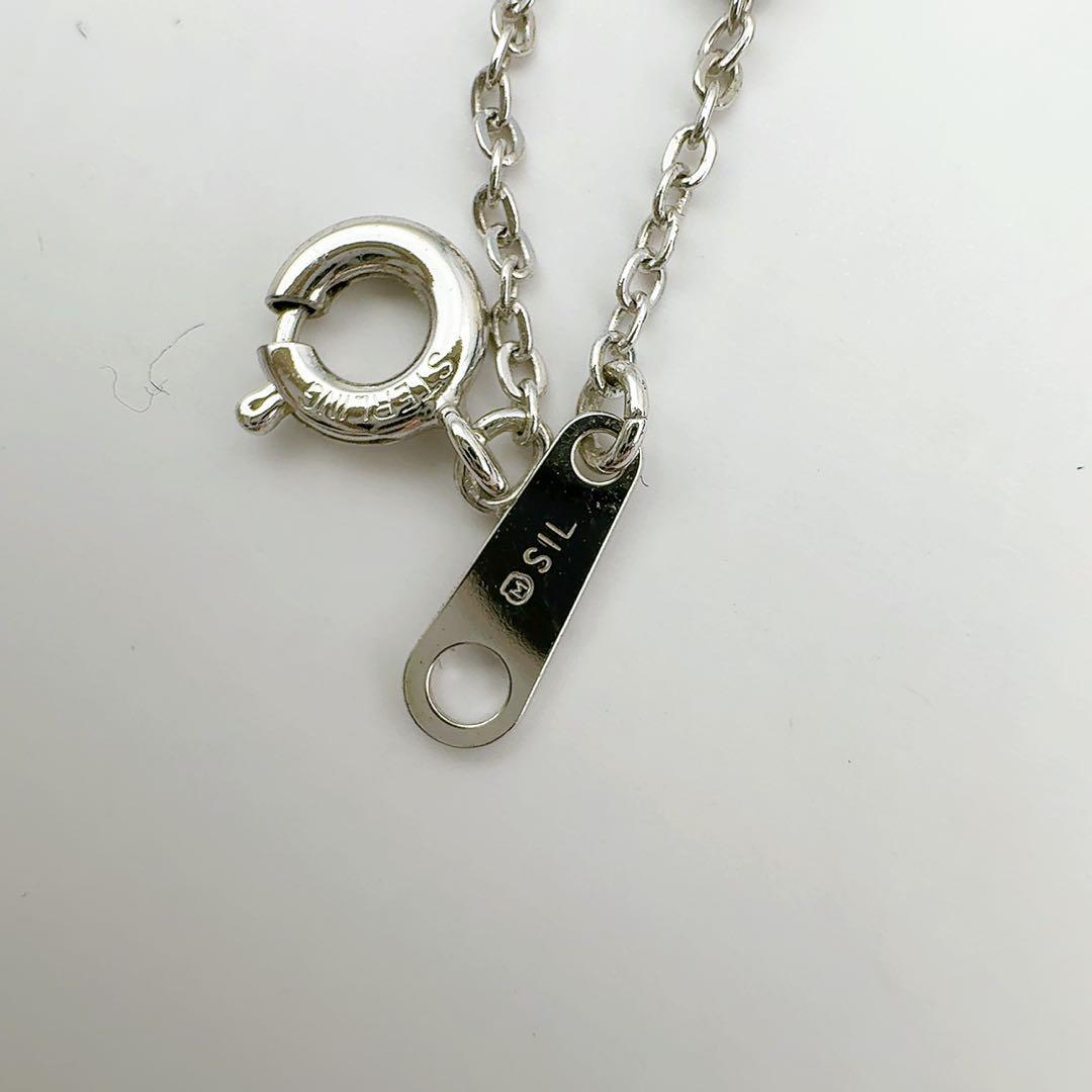 MIKIMOTO silver necklace with 39.5 cm chain displayed on a white background