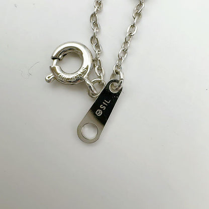 MIKIMOTO silver necklace with 39.5 cm chain displayed on a white background