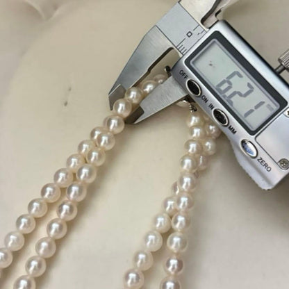 Double strand white Akoya pearl necklace with 6.0-6.5mm pearls measuring 41 cm length