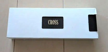 CROSS set of gold mechanical pencil and silver ballpoint pen displayed with black case and instruction manual