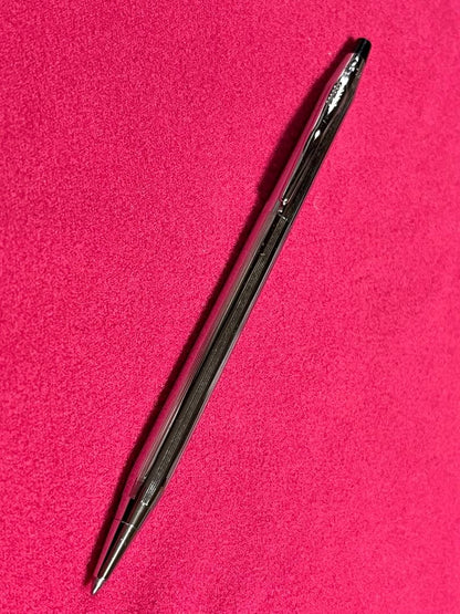 Cross Chrome Century ballpoint pen with old logo, metal body, showing used condition and minor scratches
