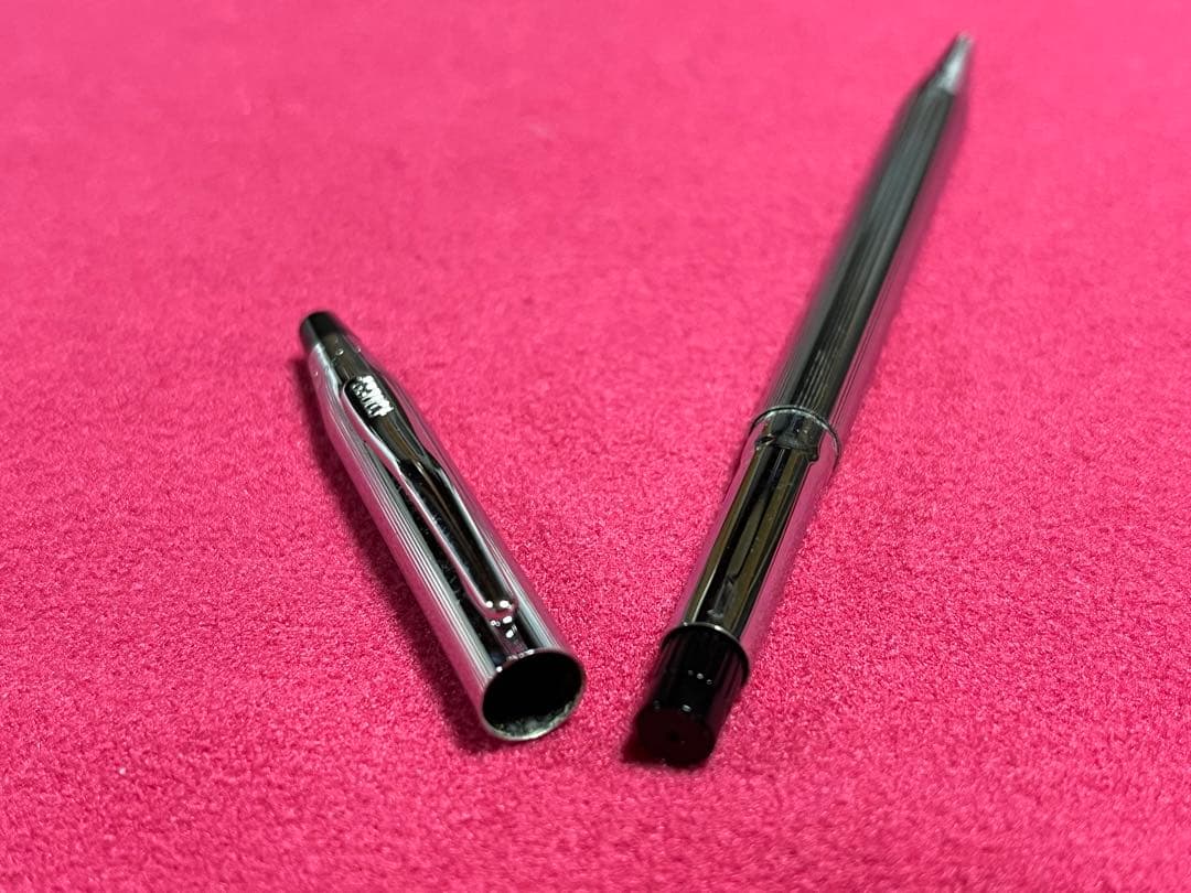 Cross Chrome Century ballpoint pen with old logo, metal body, showing used condition and minor scratches