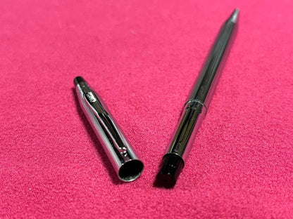 Cross Chrome Century ballpoint pen with old logo, metal body, showing used condition and minor scratches