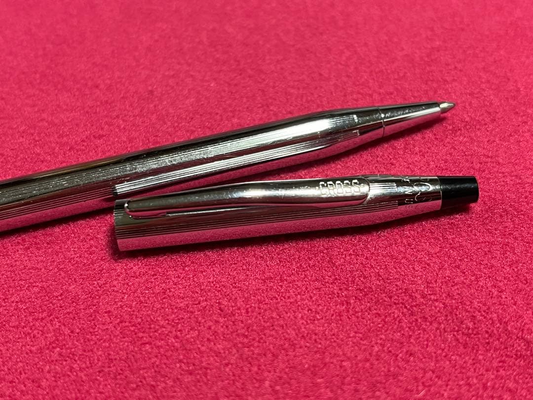 Cross Chrome Century ballpoint pen with old logo, metal body, showing used condition and minor scratches