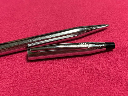 Cross Chrome Century ballpoint pen with old logo, metal body, showing used condition and minor scratches