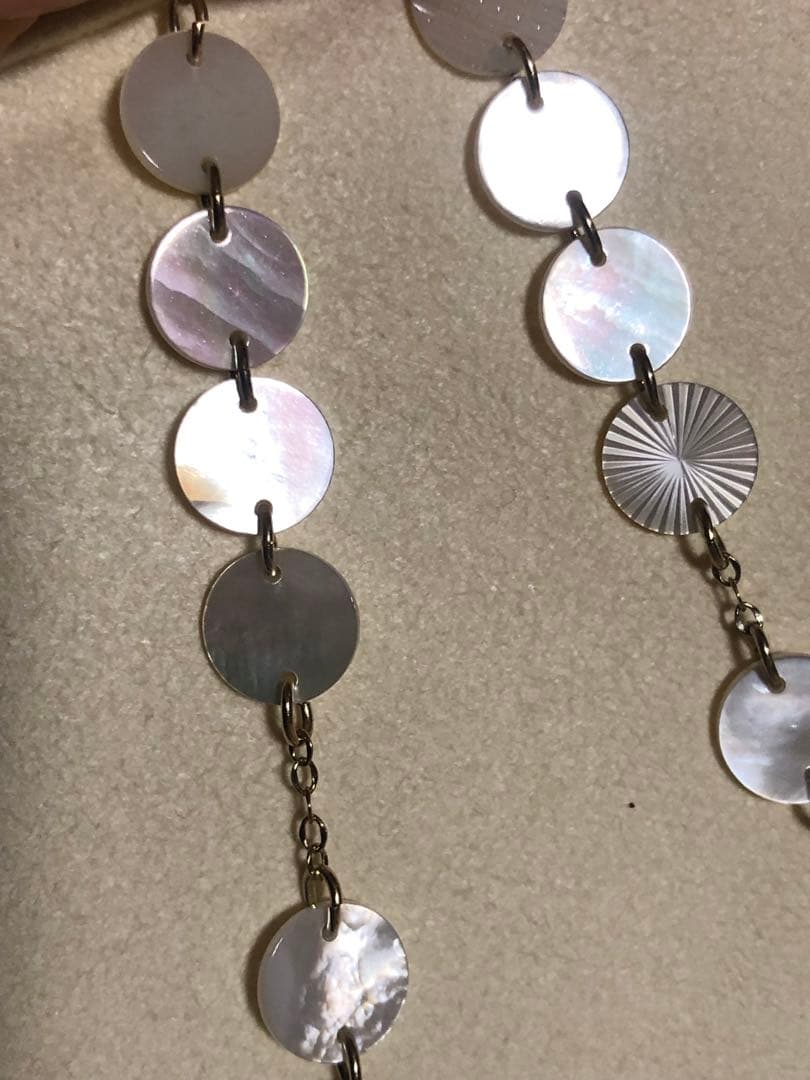 Agete white shell long necklace with silver and gold plated chain shown at 90cm length