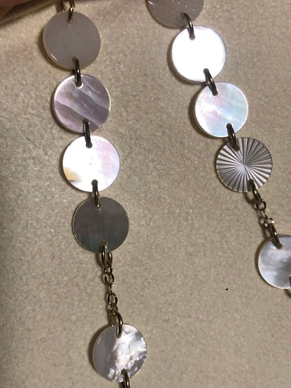 Agete white shell long necklace with silver and gold plated chain shown at 90cm length