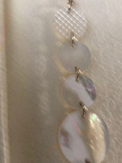 Agete white shell long necklace with silver and gold plated chain shown at 90cm length