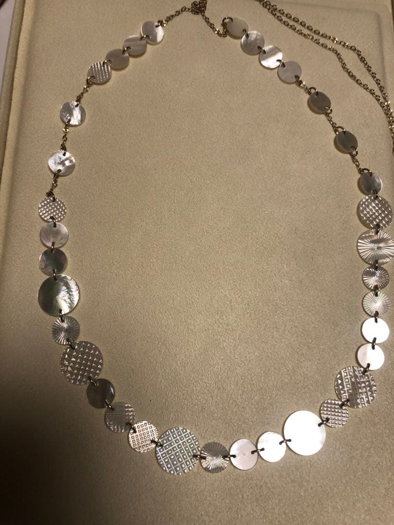 Agete white shell long necklace with silver and gold plated chain shown at 90cm length
