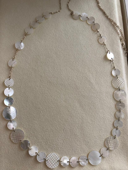 Agete white shell long necklace with silver and gold plated chain shown at 90cm length