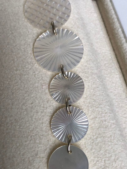 Agete white shell long necklace with silver and gold plated chain shown at 90cm length