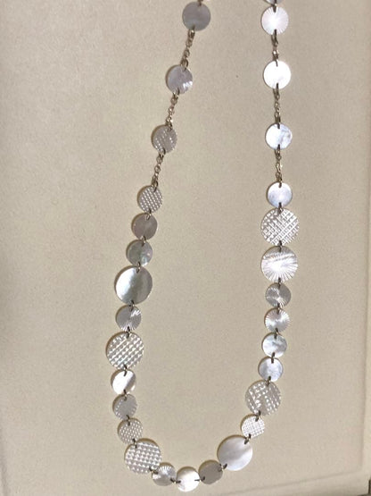 Agete white shell long necklace with silver and gold plated chain shown at 90cm length