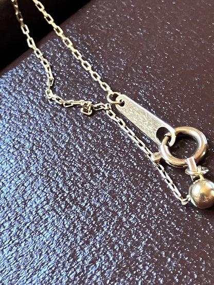 Agete 10K gold Y-shaped necklace with diamond decoration on a white background