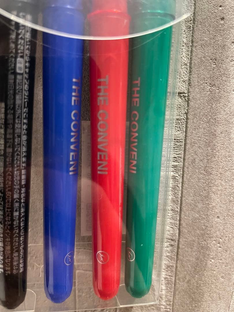 Pilot Frixion 4-color ballpoint pen set with green red blue and black erasable ink pens featuring fragment lightning bolt and convenience store logos