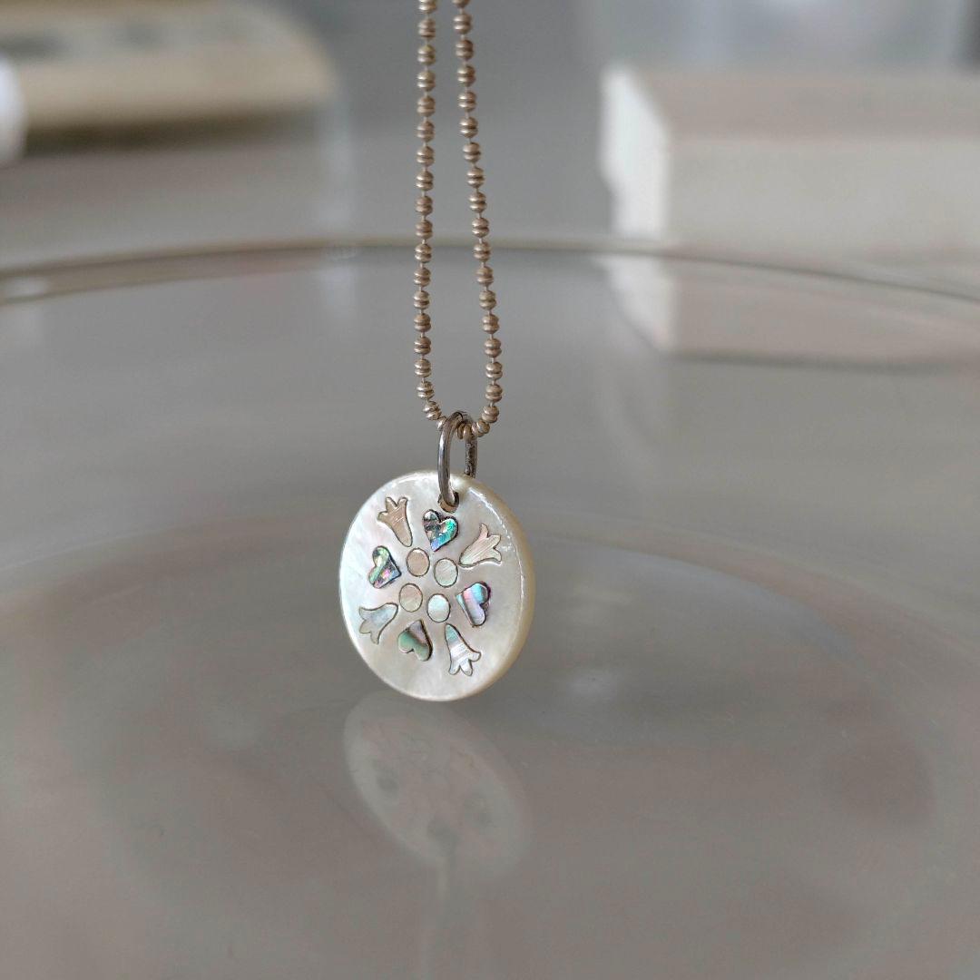 agetE shell charm necklace with heart and cross in sterling silver with white mother of pearl charm